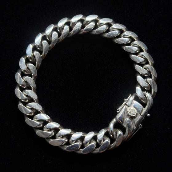Miami Cuban Silver chain on a black background