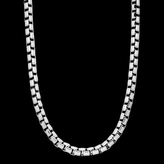 Silver chain necklace on a white background