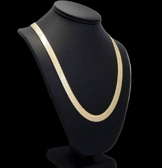 Gold plated over brass herringbone necklace on a black mannequin bust against a white background